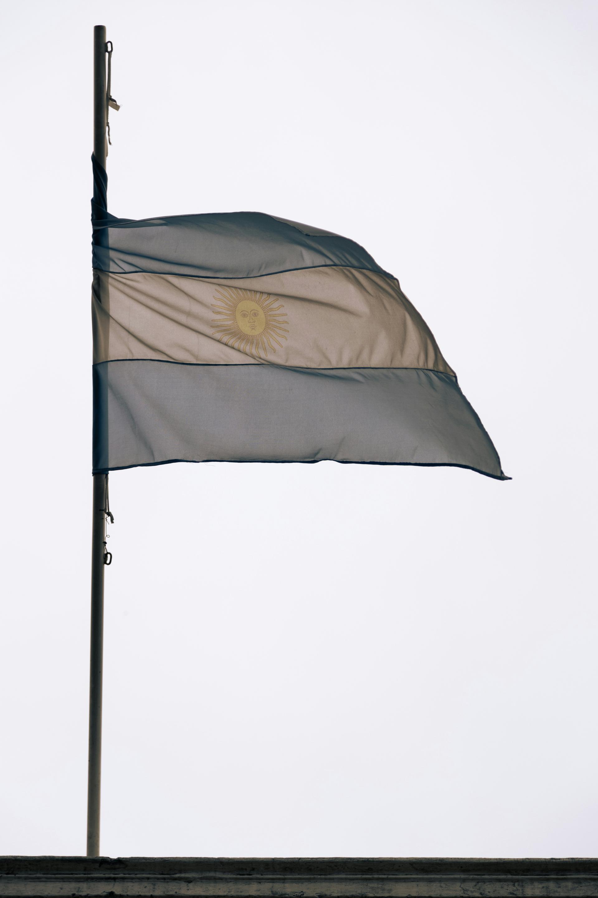 Casa Rosada on Plaza de Mayo under an overcast sky