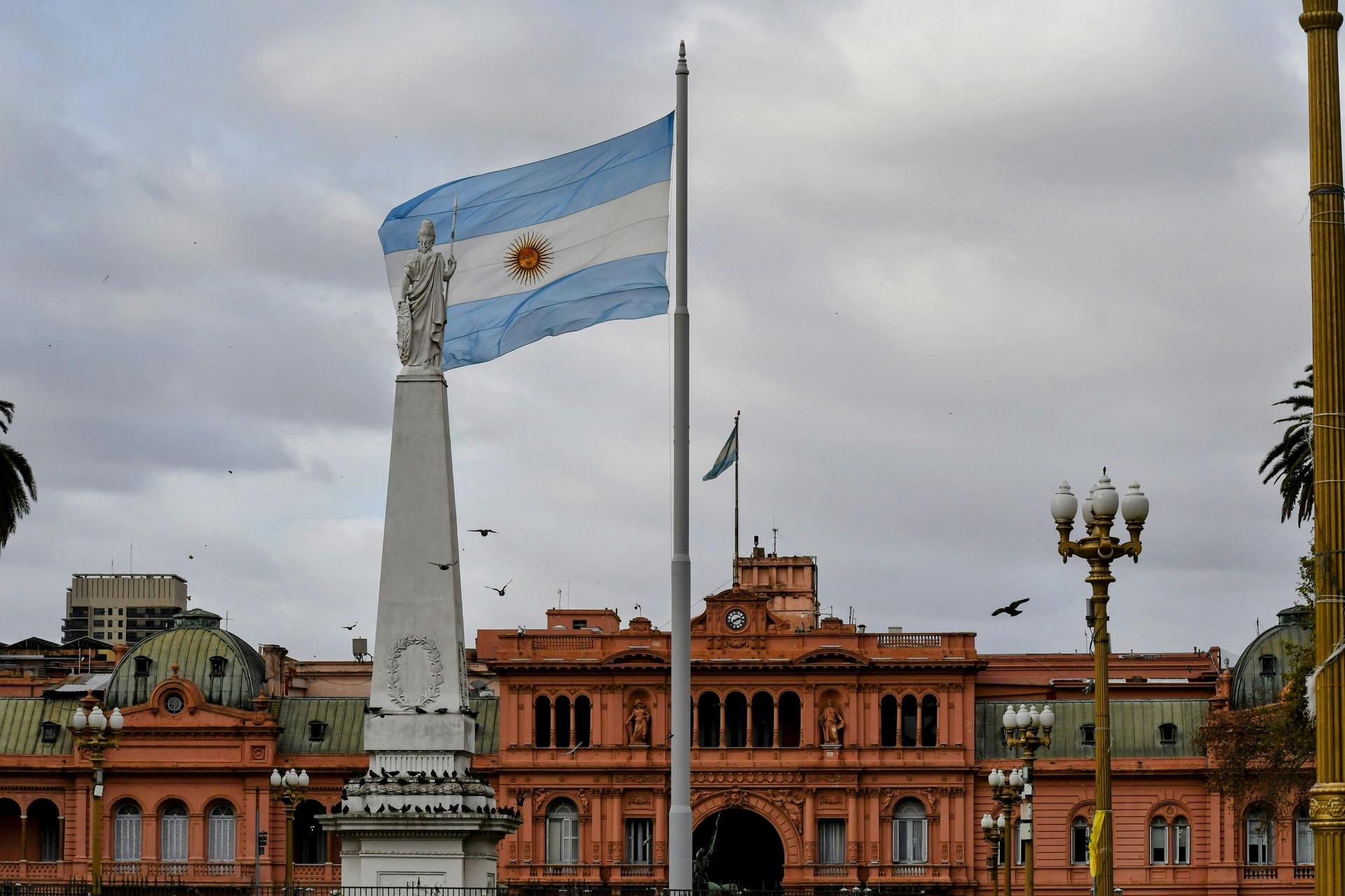 Argentine flag at Plaza de Mayo with the Casa Rosada presidential palace