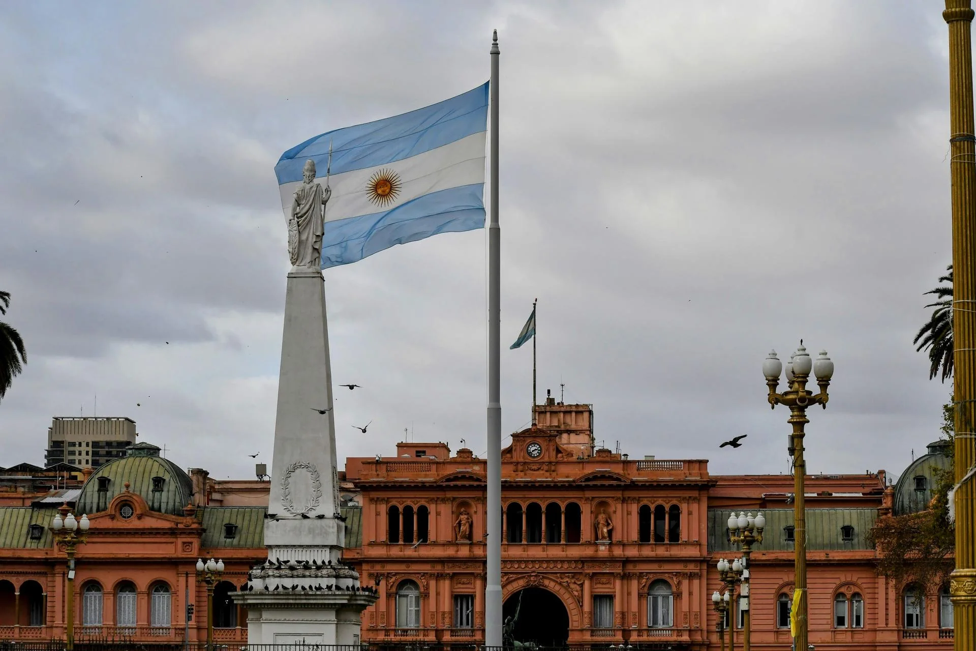 Argentine flag at Plaza de Mayo with the Casa Rosada presidential palace